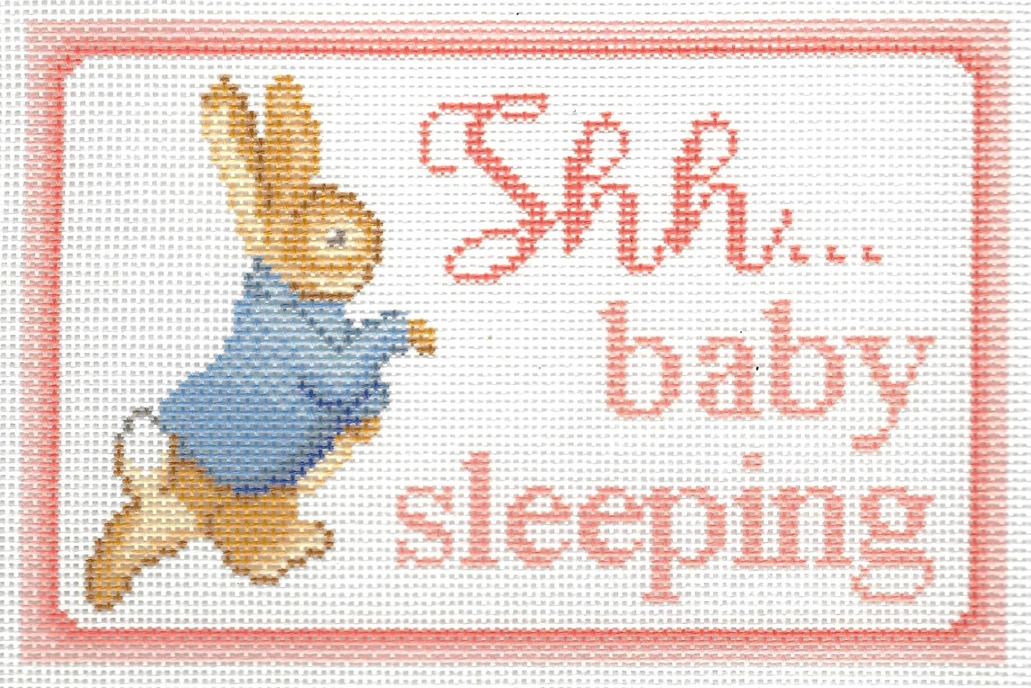 Needlepaint needlepoint canvas of Peter Rabbit with 'Shh... baby sleeping' text on a white background with light pink border