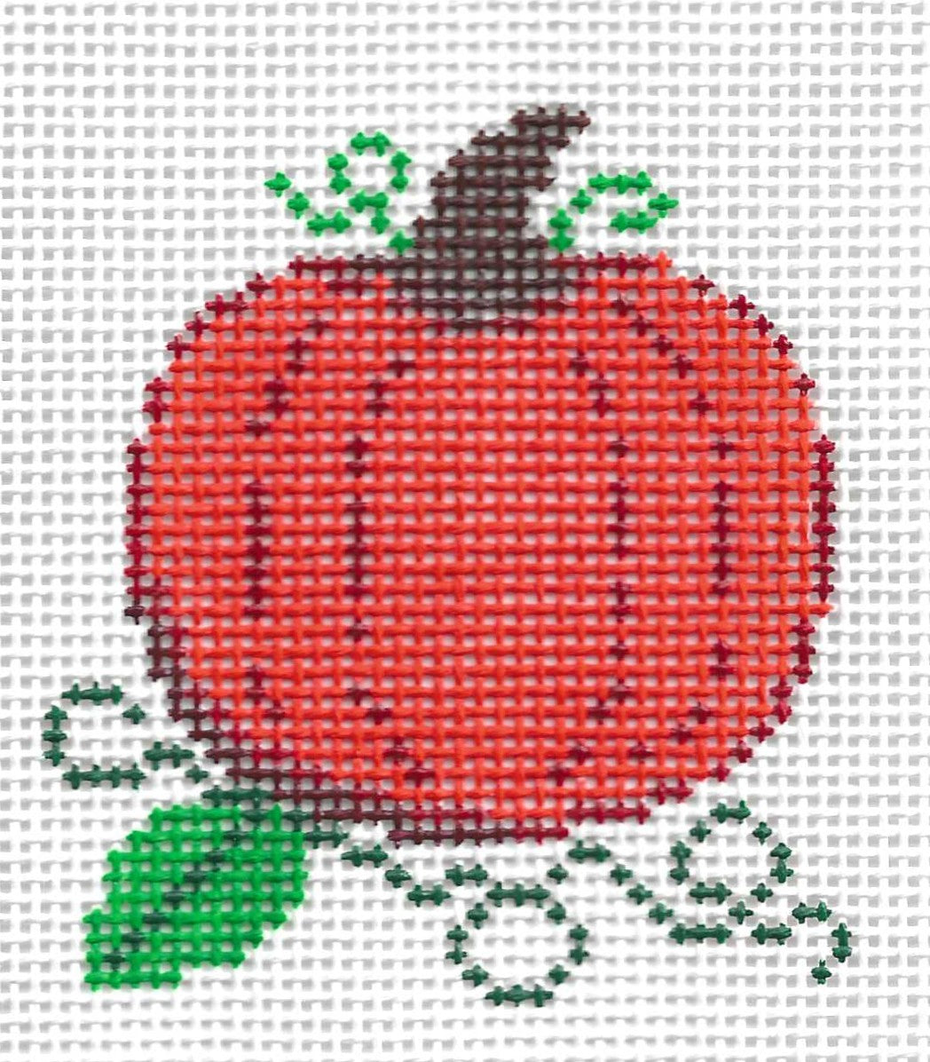 k.ndlpt needlepoint canvas of a pumpkin with green leaves on a white background.
