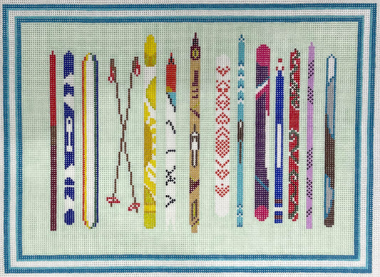 Alice & Blue needlepoint canvas of a collection of stylized skis with various patterns and colors