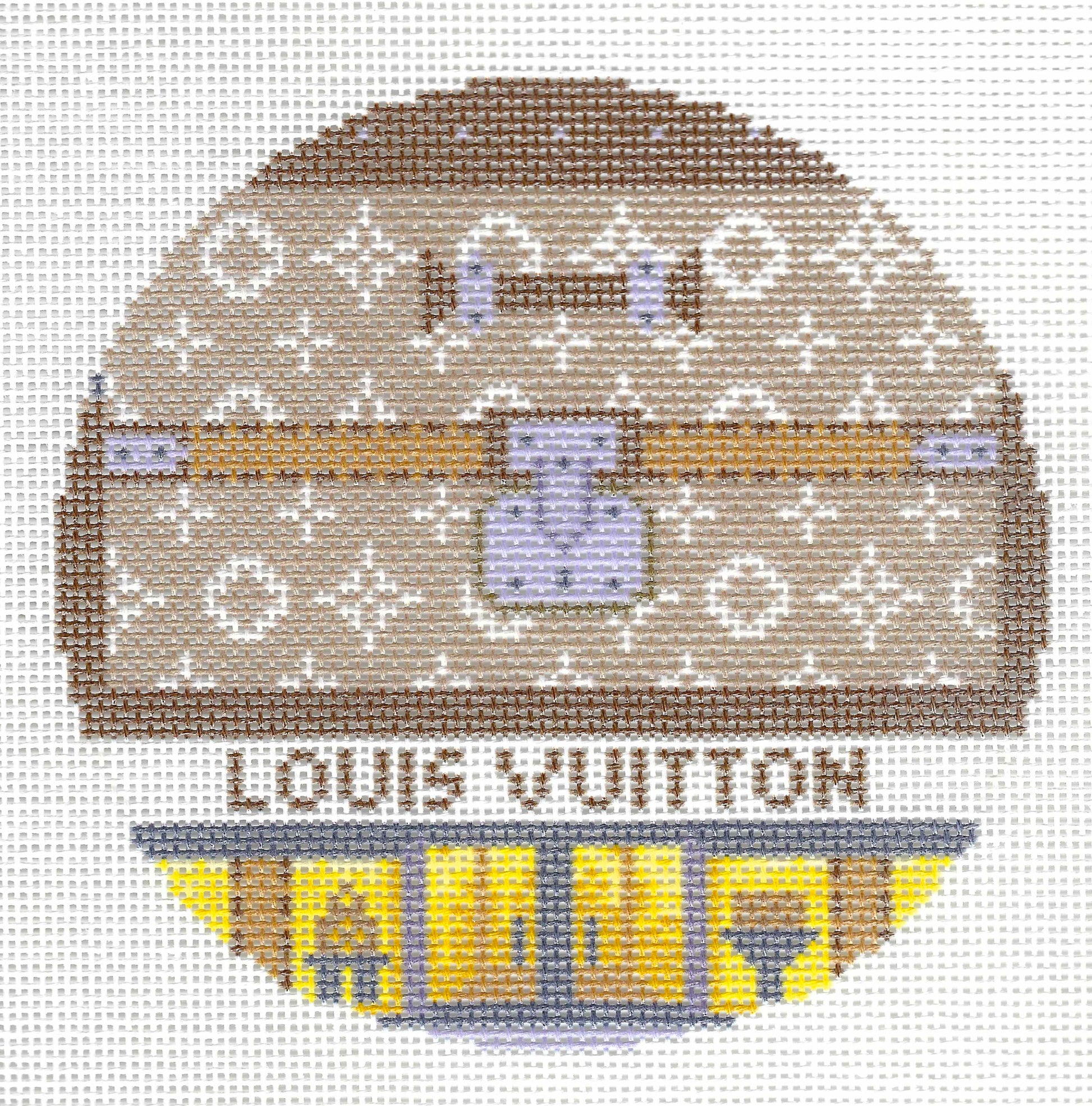 Gingham Stitchery needlepoint canvas of Louis Vuitton-themed storefront design featuring a brown monogrammed motif with a central padlock and a yellow-and-blue doors with 'LOUIS VUITTON' text.