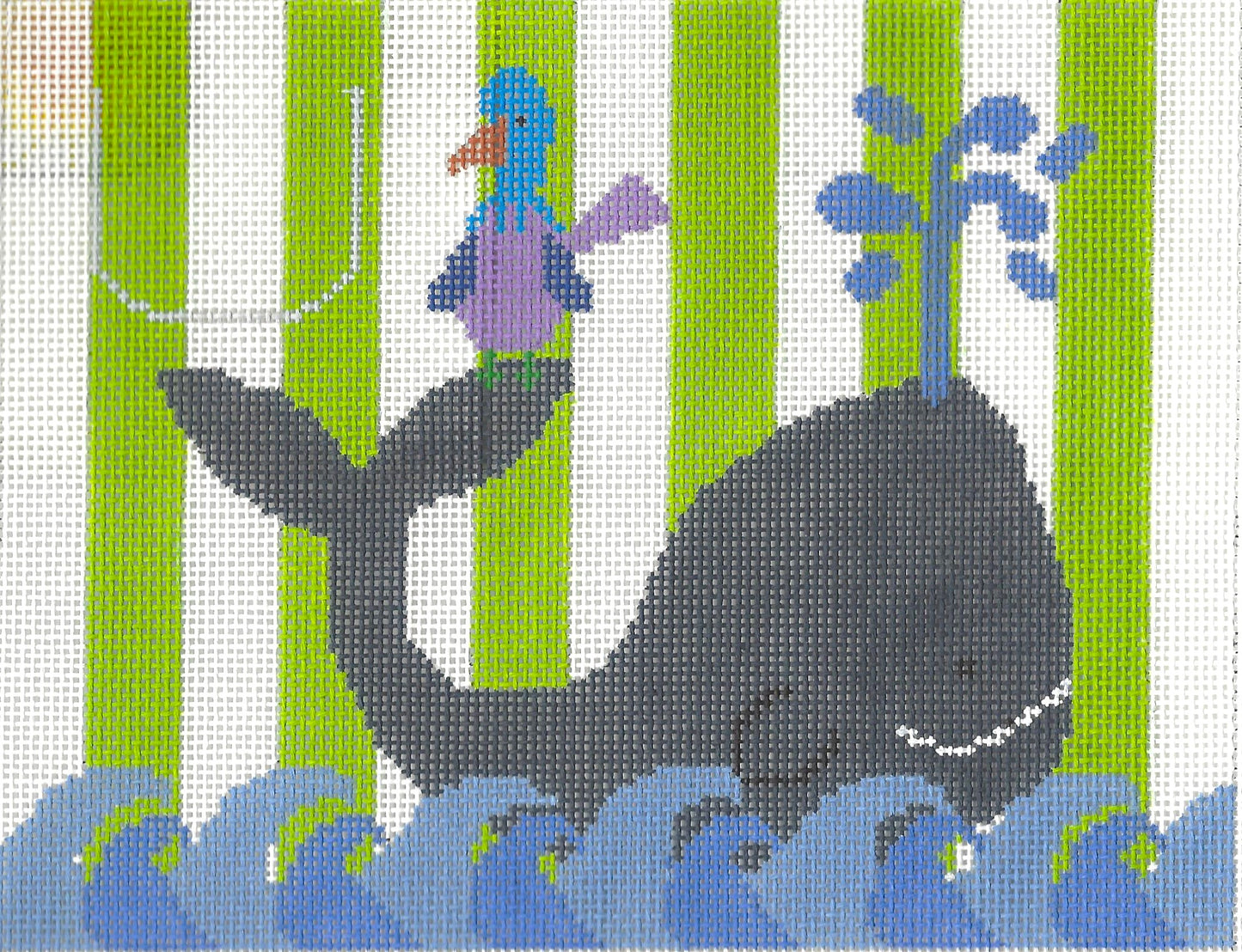The Meredith Collection tooth fairy pillow needlepoint canvas of whale blowing water with bird on tail on a striped green and white background