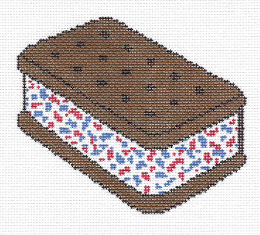 Gentry Stitchery needlepoint canvas design of an ice cream sandwich with red and blue sprinkles on the ice cream.