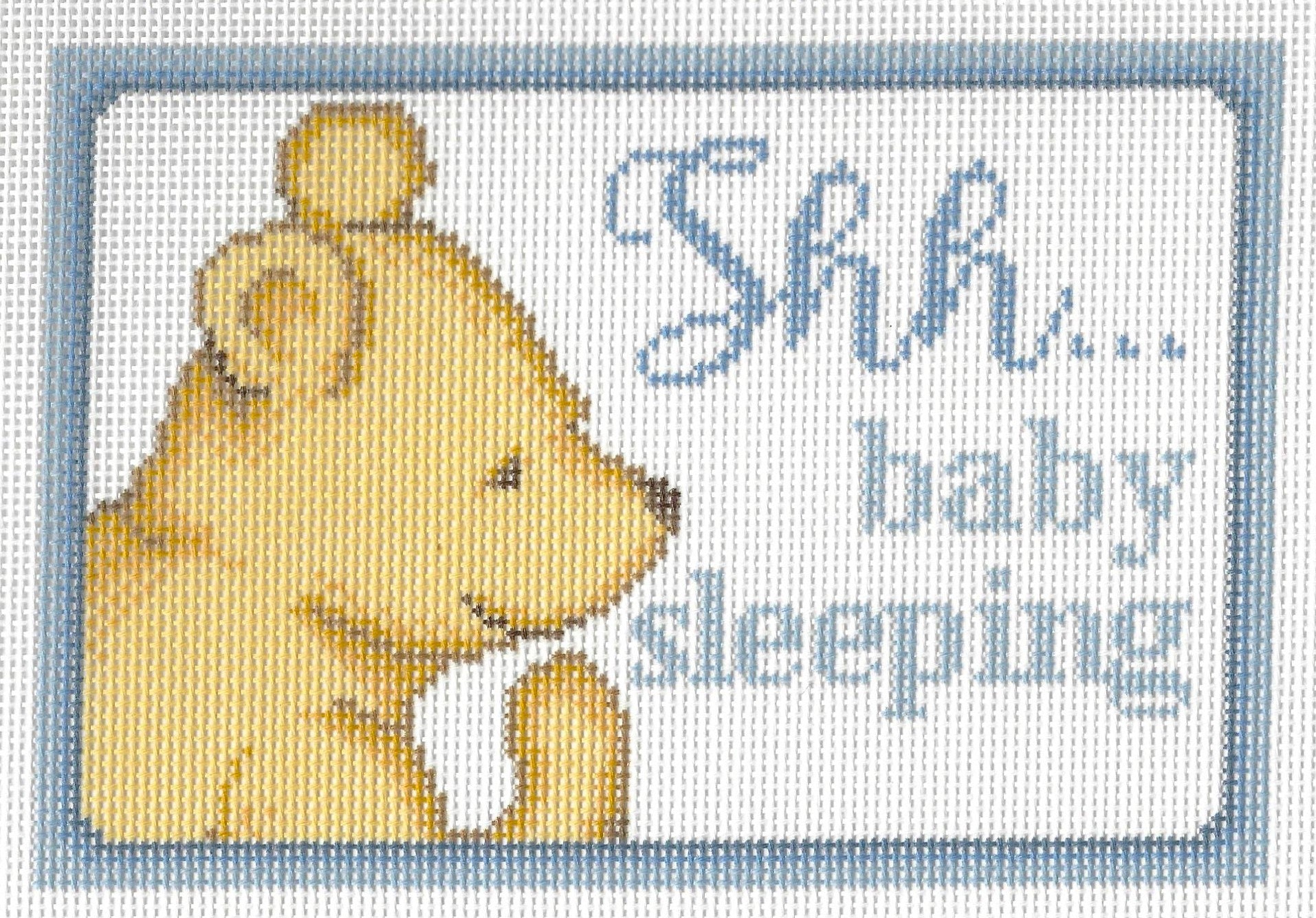 Needlepaint needlepoint canvas of Winnie the Pooh with 'Shh... baby sleeping' text on a white background with light blue border