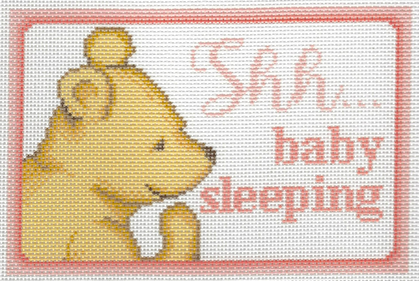 Needlepaint needlepoint canvas of Winnie the Pooh with 'Shh... baby sleeping' text on a white background with light pink border