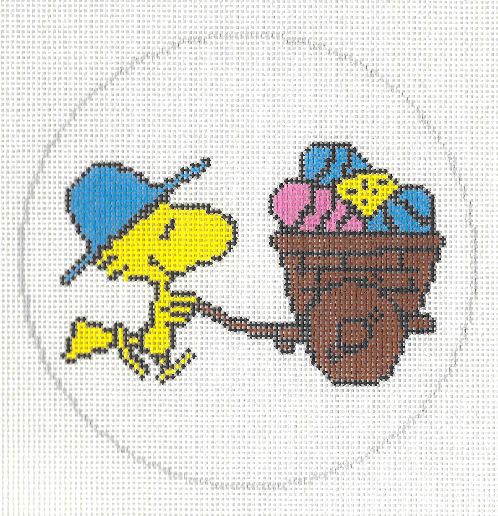 Officially Needlepoint round canvas of Woodstock with Easter egg wagon