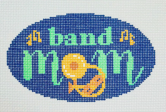 KCN Designers needlepoint canvas of 'Band Mom' with a brass instrument for the 'O' in 'mom' on a dark blue background.