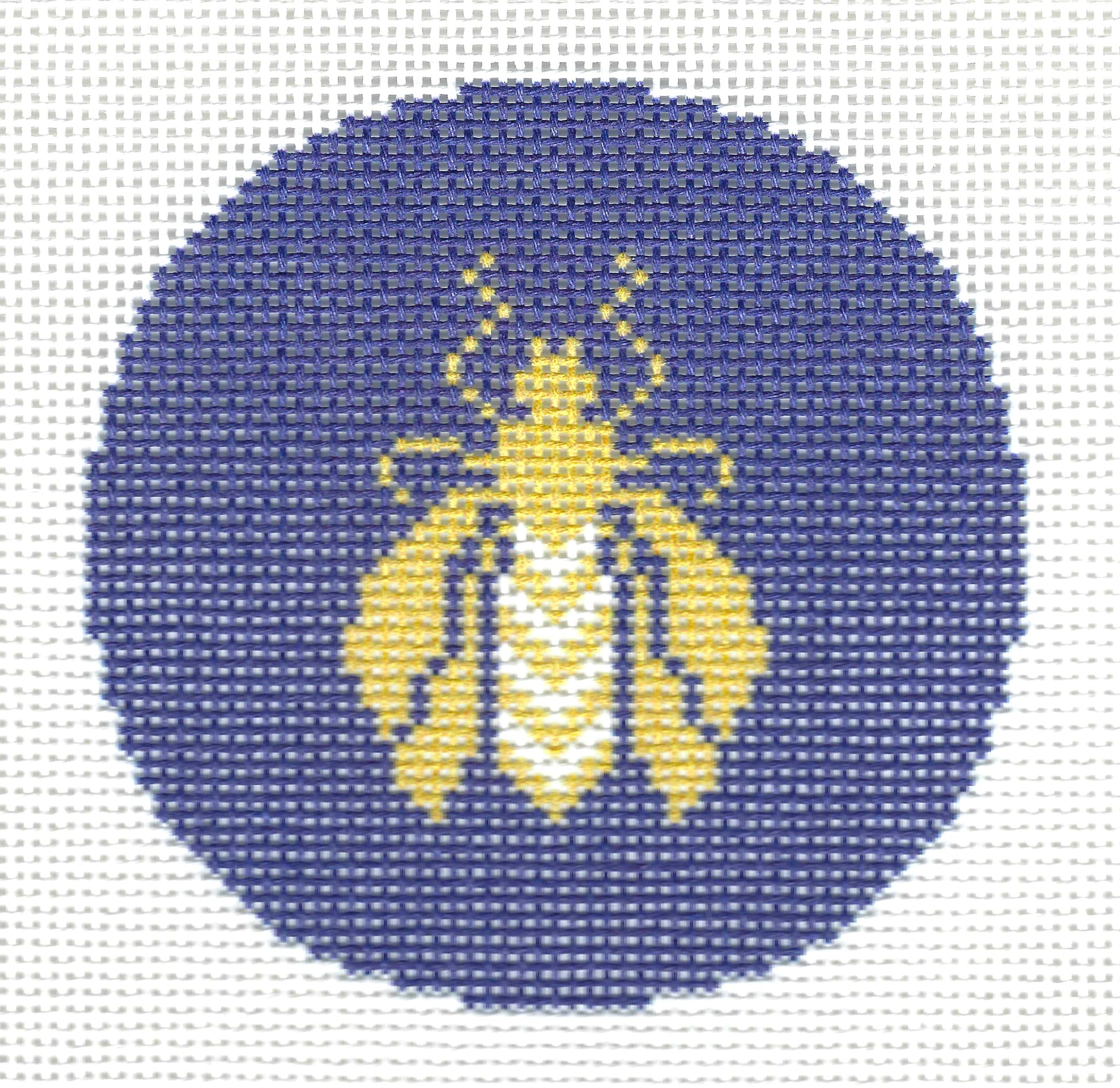 Needlepoint To Go circular needlepoint canvas featuring a stylized yellow and white bee on a dark blue background.