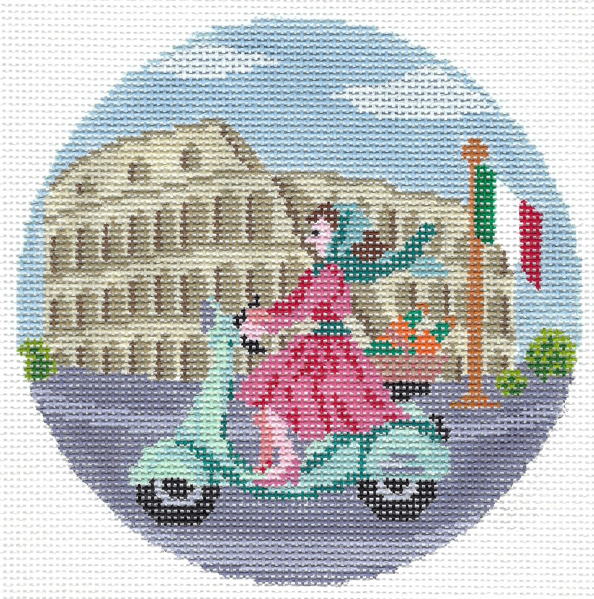 Gingham Stitchery round needlepoint canvas of a woman on a vespa in front of the Colosseum in Rome with an Italian flag.