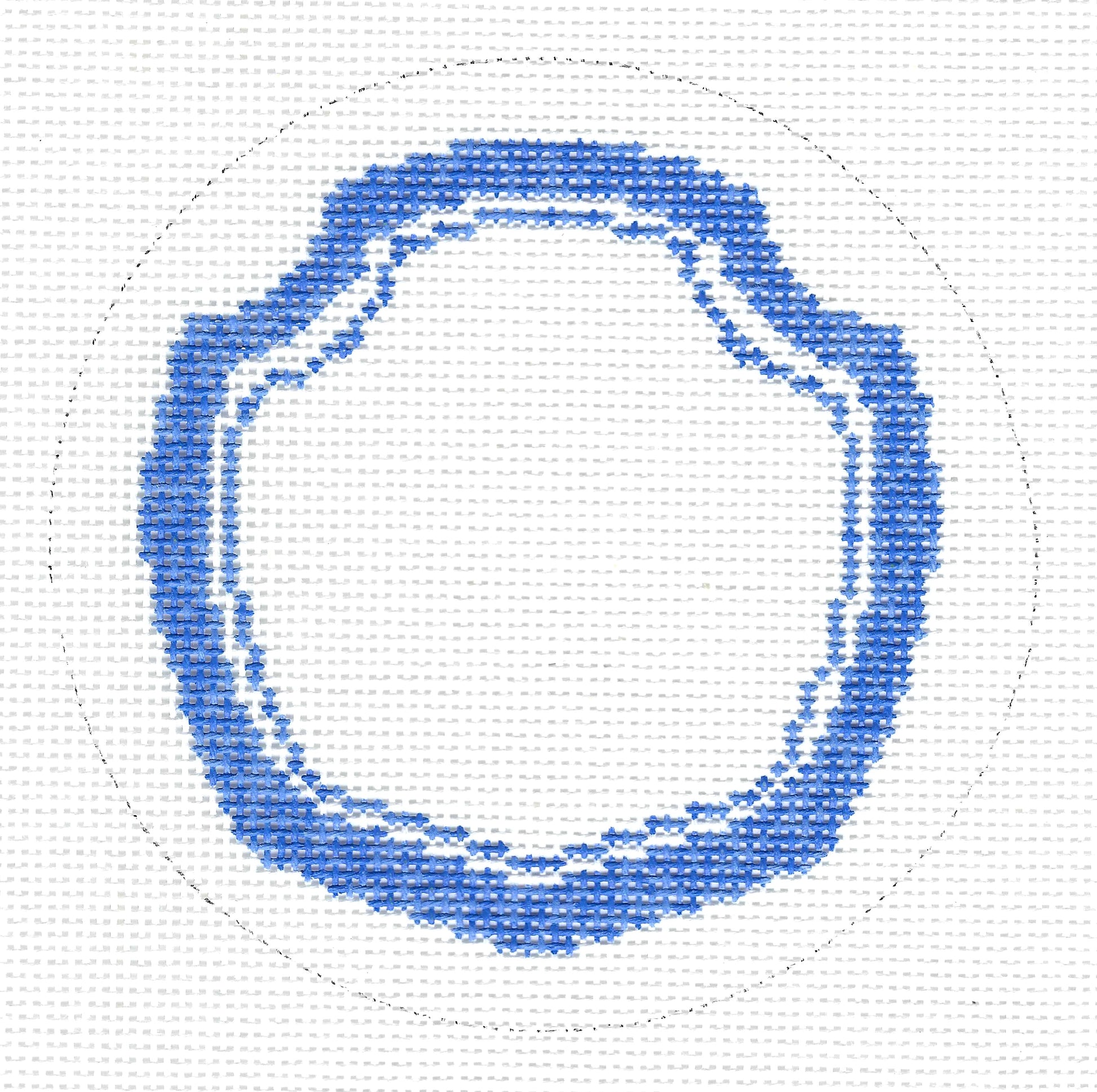 Threaded & Tipsy needlepoint canvas of circular blue pattern on a white background.