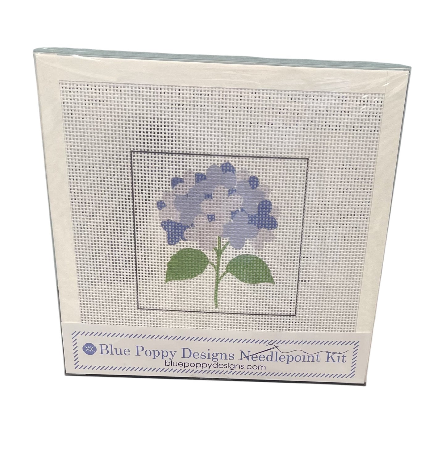 Blue Poppy Designs needlepoint kit with a blue hydrangea design on a white background