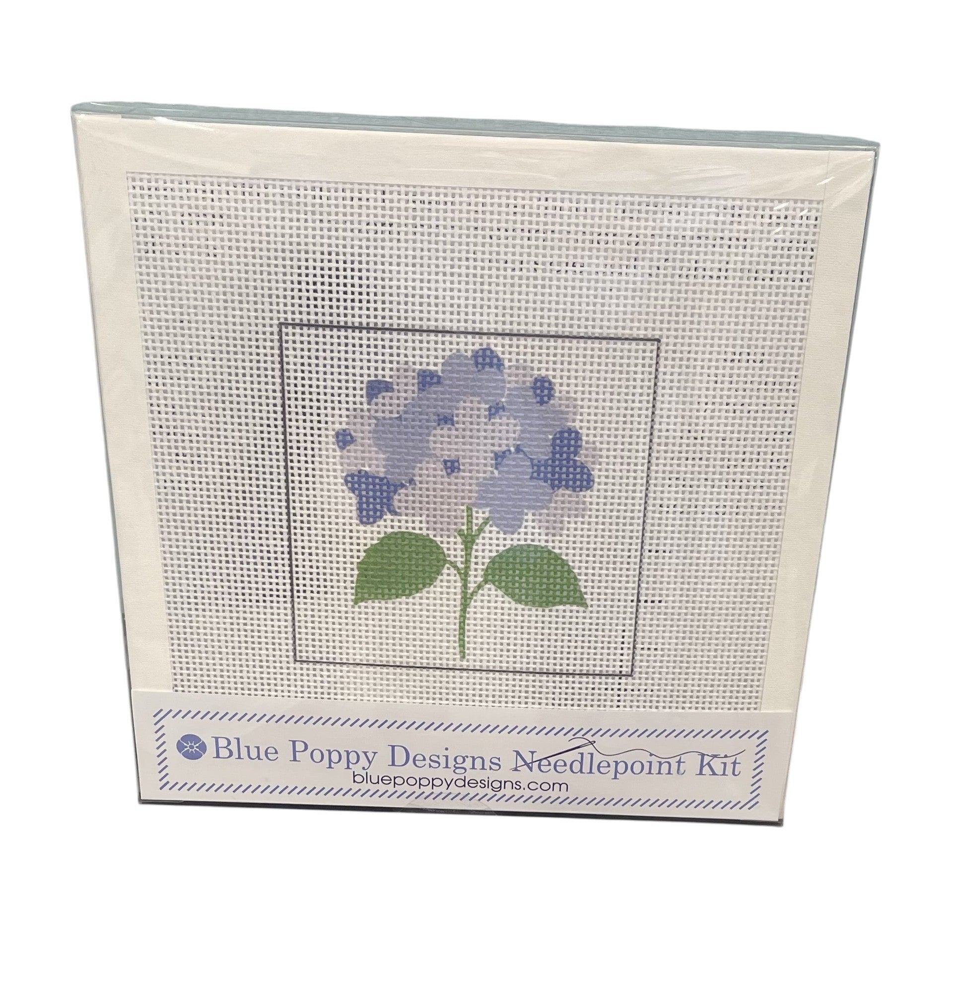 Blue Poppy Designs needlepoint kit with a blue hydrangea design on a white background