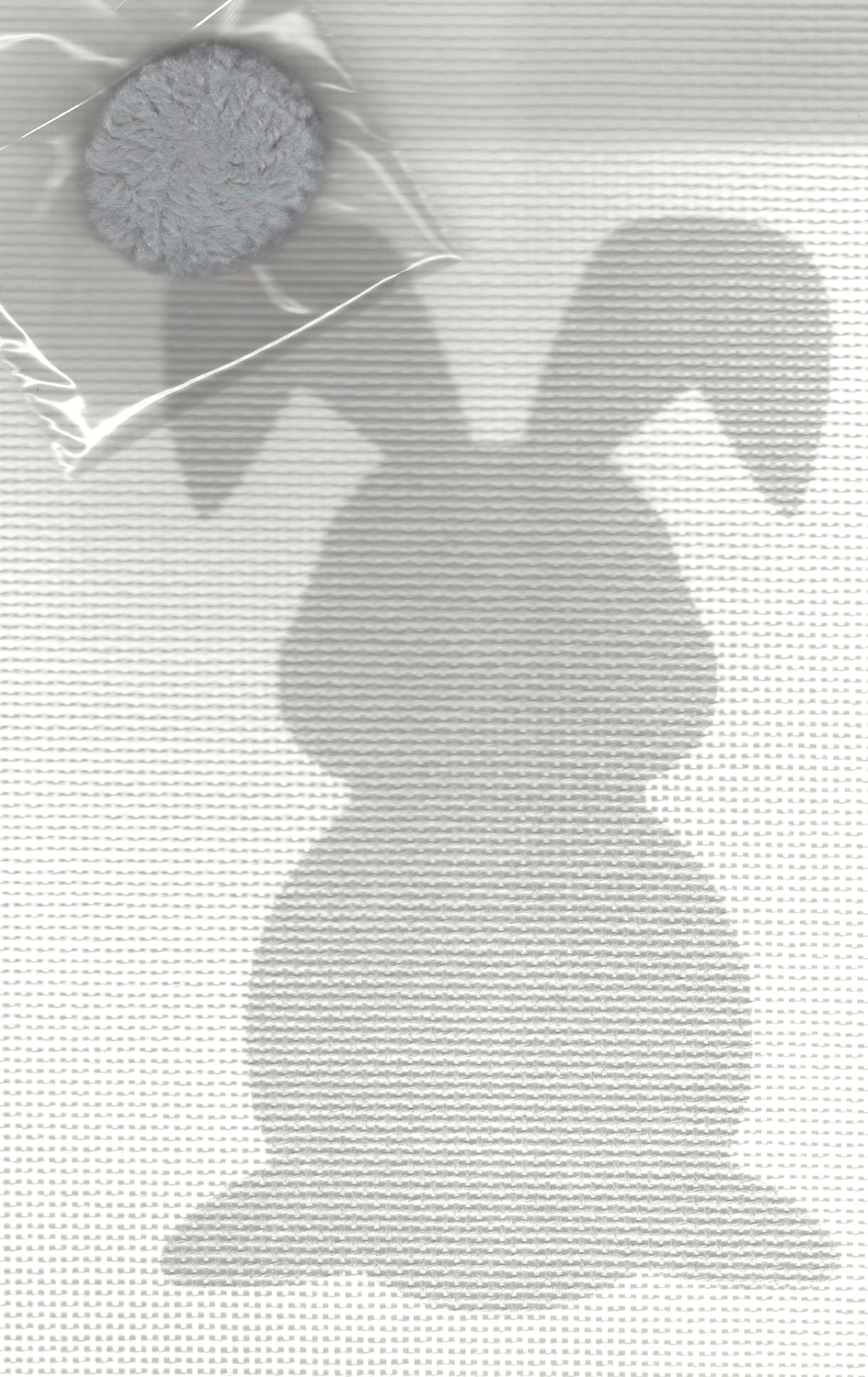 Pepita needlepoint canvas of gray bunny with gray pom pom tail
