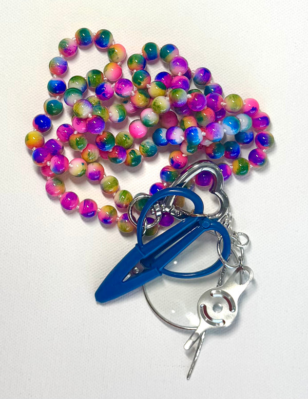 Victoria Whitson chatelaine with gemstone beach ball fun beads with magnifying glass, mini scissors, and accessories.