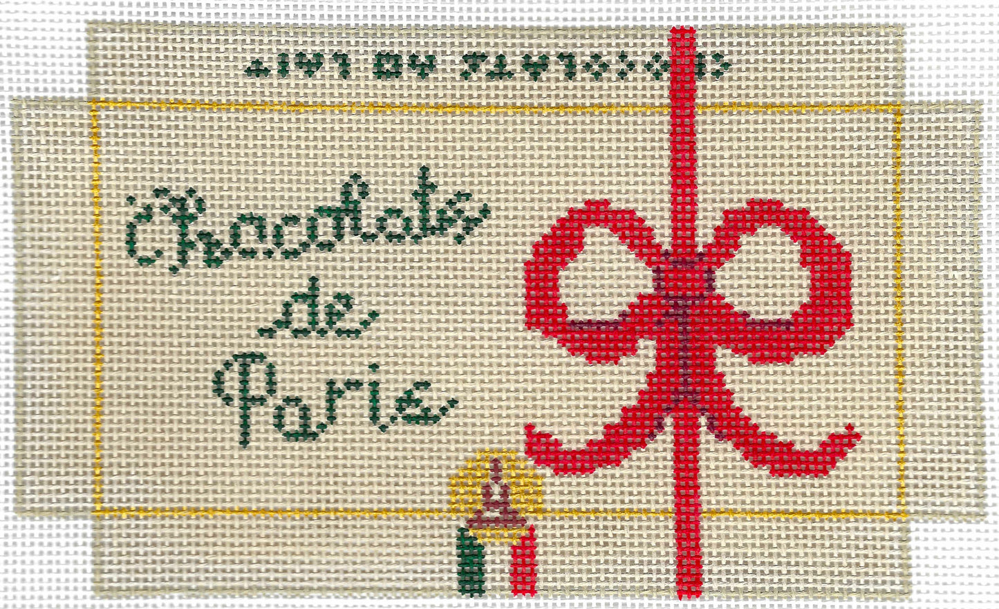 Stitch Style Allie Egan Design Series needlepoint canvas of a 3D chocolate box with a red bow and text 'Chocolates de Paris' on a beige background.