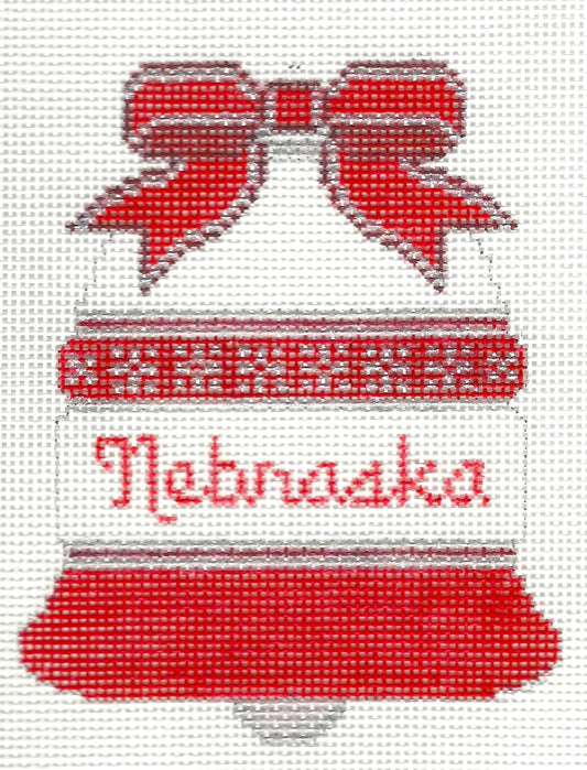 J. Malahy Designs needlepoint canvas of a red and white bell with 'Nebraska' text on a white background