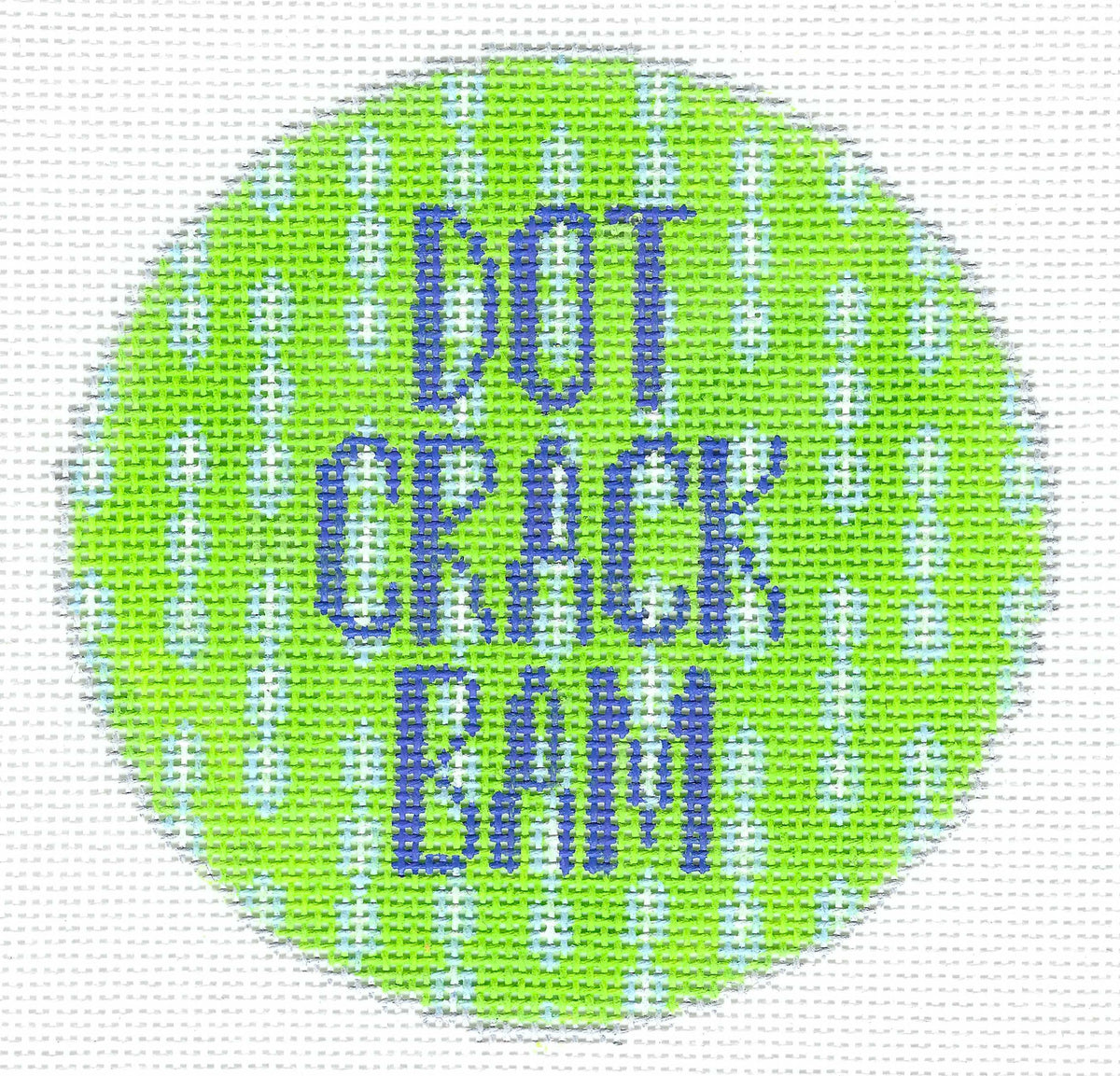 Melissa Loves Needlepoint circular needlepoint canvas with a bright lime green background, white dotted vertical patterns, and blue text reading 'DOT CRACK BAM'.