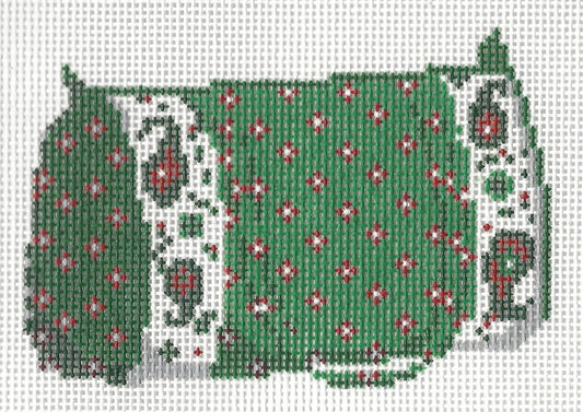Ann Kaye needlepoint canvas of a green duffle bag with red and white floral patterns on a white background