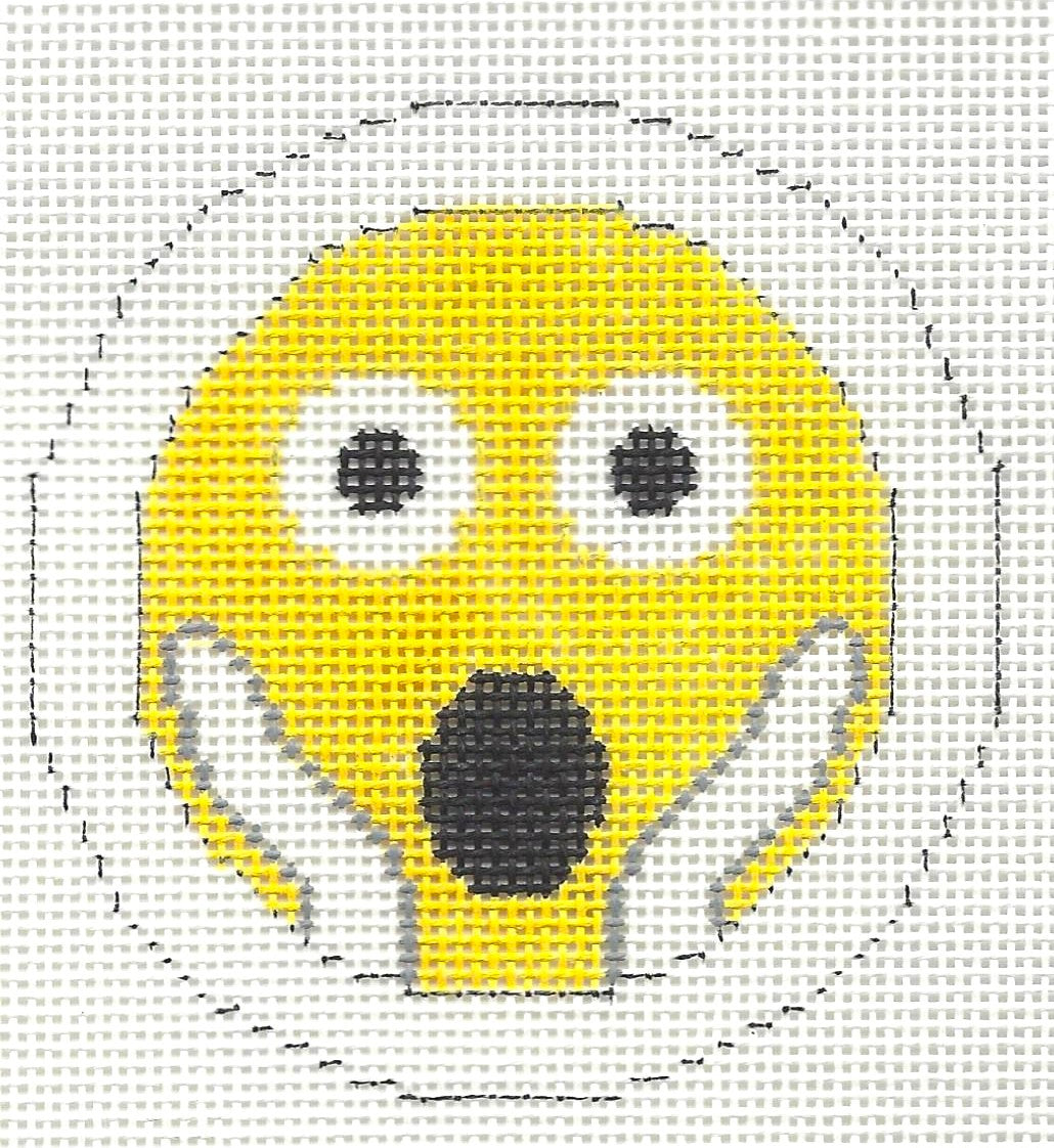 Sew Much Funround  needlepoint canvas of yellow emoji with wide eyes and an open mouth on a white background.