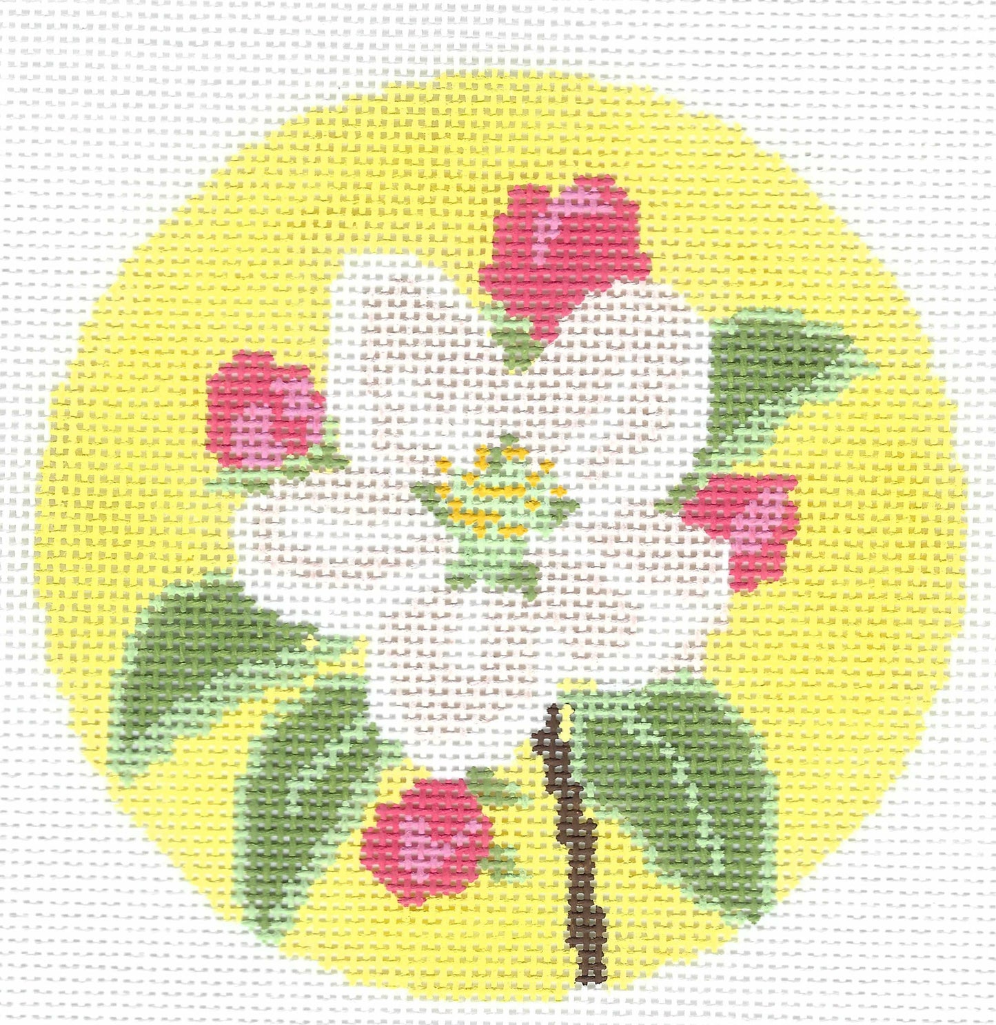 Lucky Lotus circular floral needlepoint canvas featuring a white flower with pink blossoms and green leaves on a bright yellow background.
