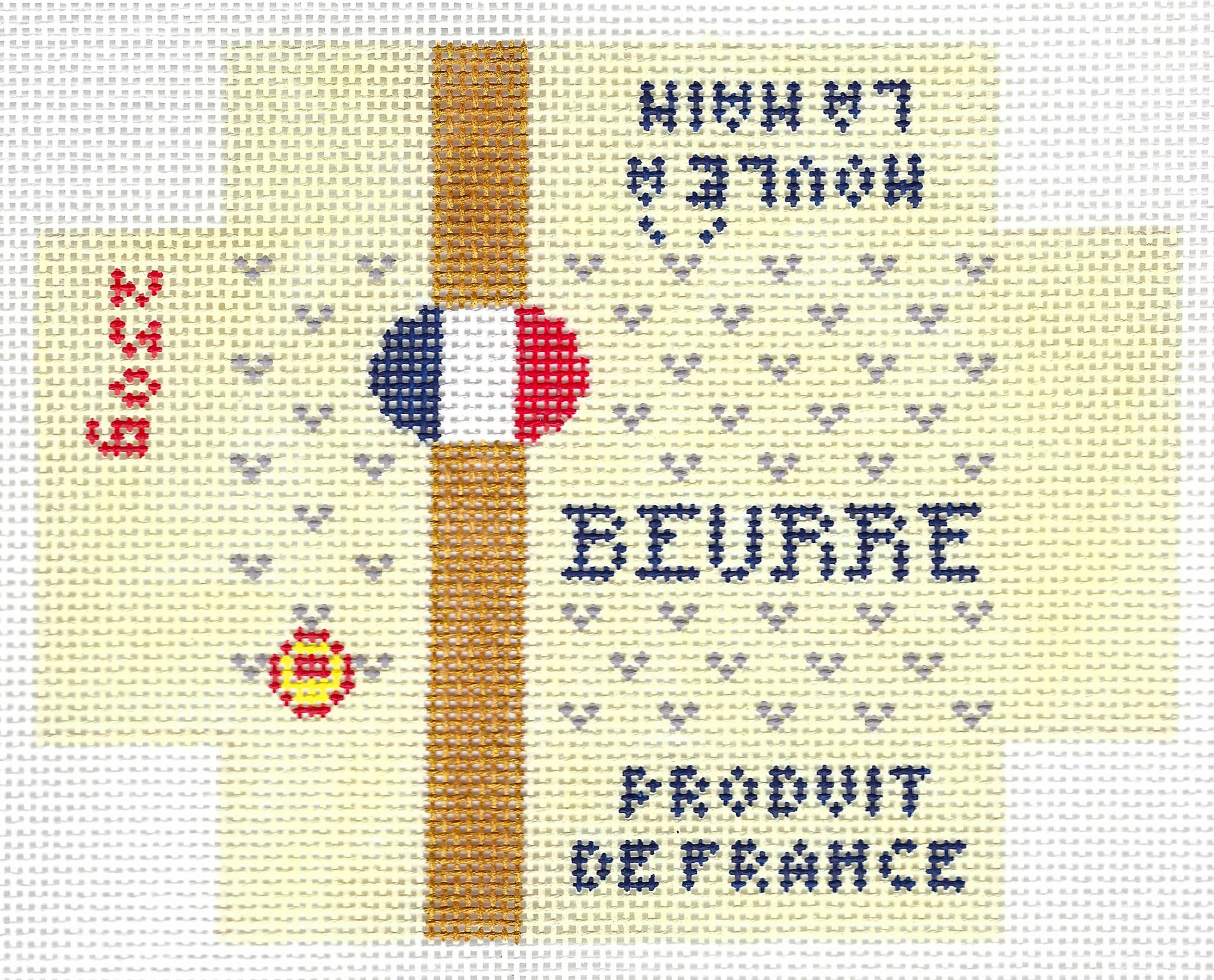Stitch Style needlepoint canvas of a 3D French butter package with text 'beurre', 'produit de france', 'moulé à la main' and a French flag on a yellow background.