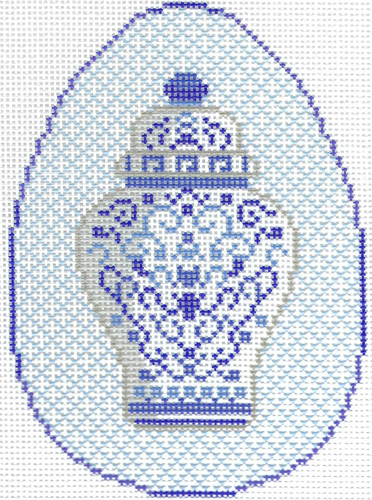 Needlepaint needlepoint canvas design featuring a blue and white patterned ceramic vase centered inside a large light blue egg-shaped border on a white background.