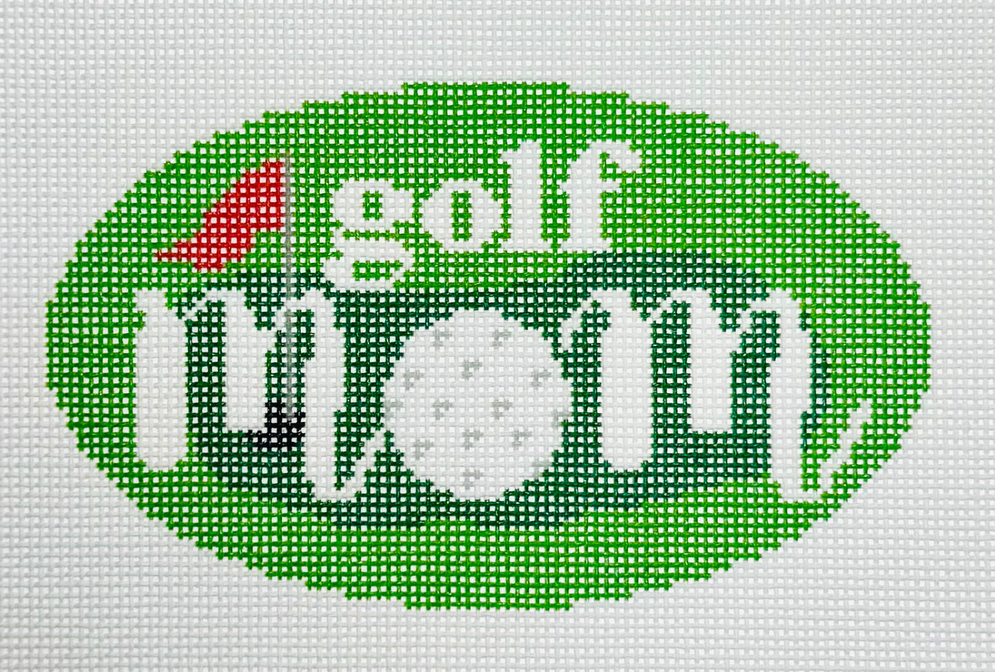 KCN Designers needlepoint canvas of 'Golf Mom' with a golfball for the 'O' in 'mom' on a green background.