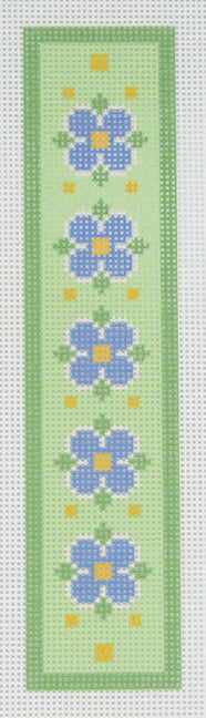 Tilli Tomas Planet Earth needlepoint canvas of bookmark with blue flowers on a green background.