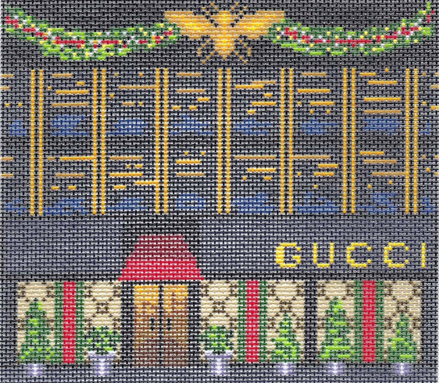 Gingham Stitchery needlepoint canvas of Gucci store front with a golden bee.