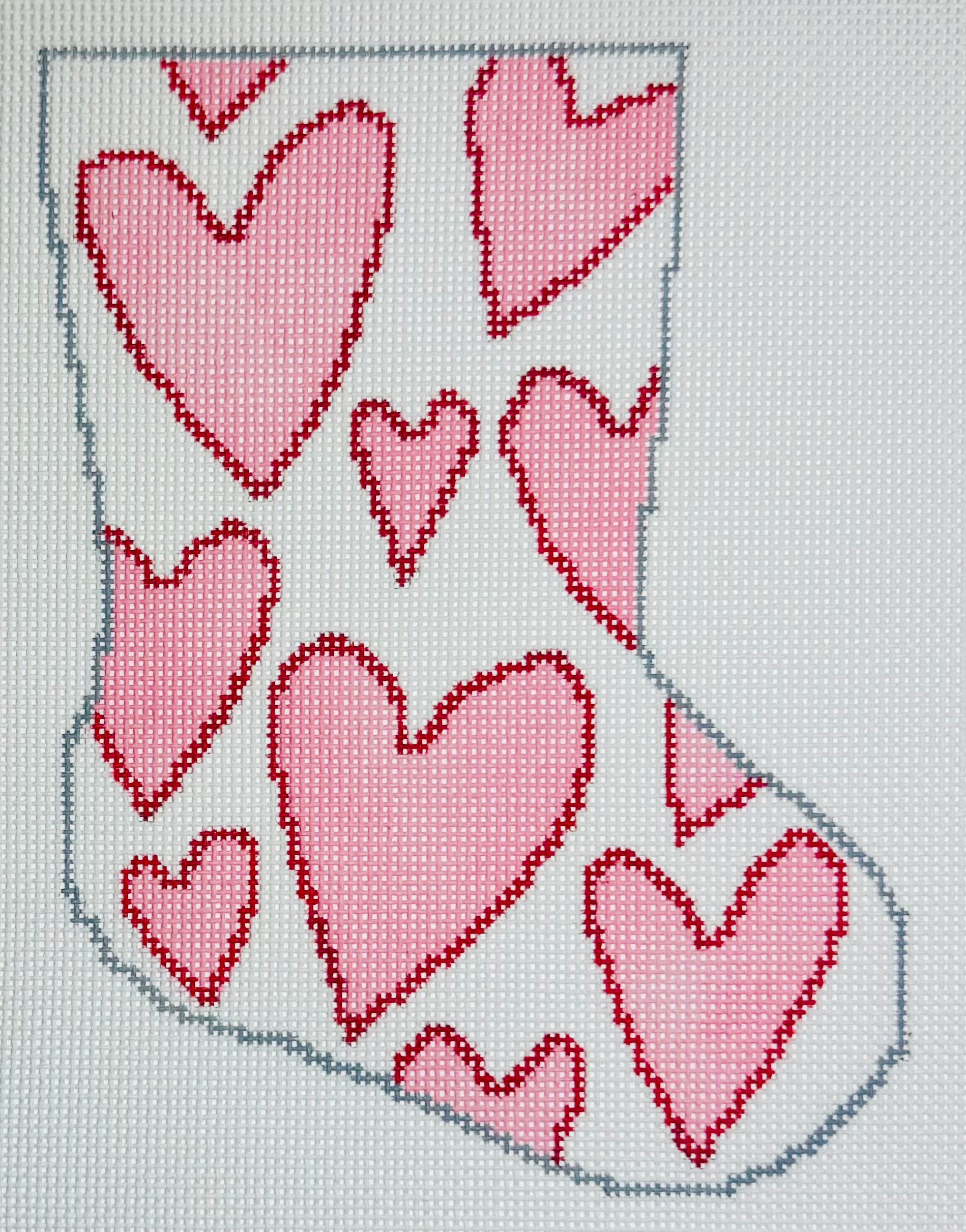 KCN Designers needlepoint canvas of Bauble Stocking with pink hearts with red outlines on a white background
