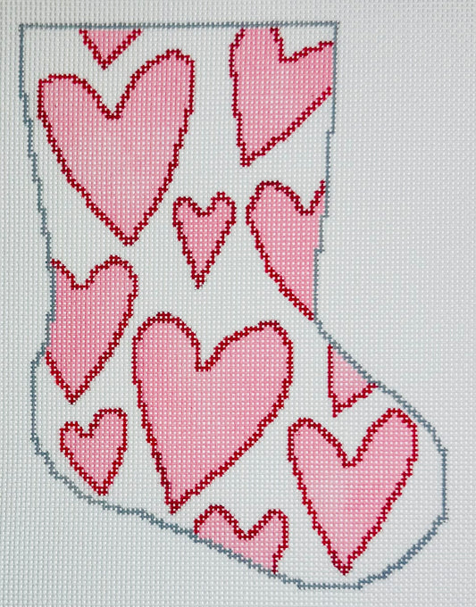 KCN Designers needlepoint canvas of Bauble Stocking with pink hearts with red outlines on a white background