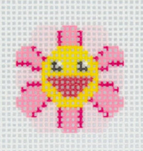 Tilli Tomas Planet Earth needlepoint canvas of key fob insert of a pink flower with a yellow smiley face center