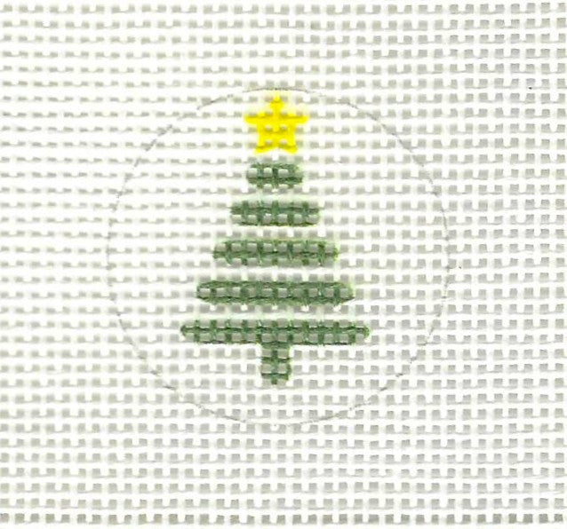 Tilli Tomas Planet Earth needlepoint canvas of a Christmas tree design with a yellow star on top.
