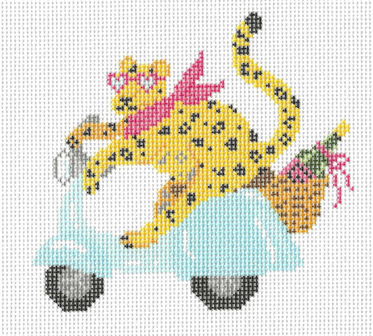 KCN Designers needlepoint canvas of a leopard wearing a pink scarf and sunglasses on a scooter with a basket on a white background.