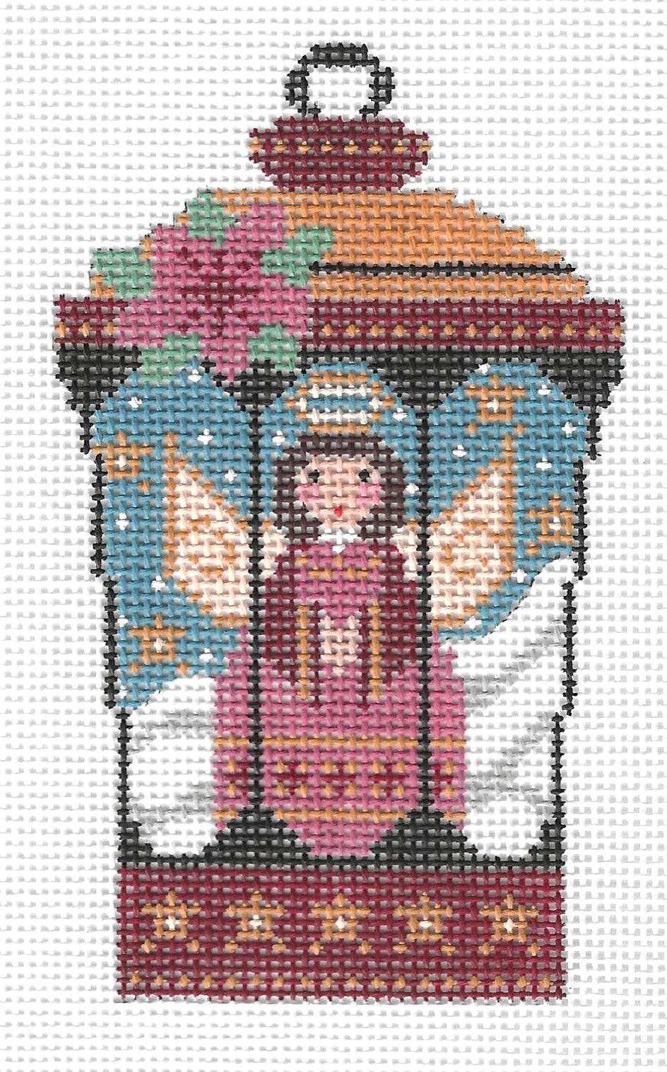 Danji Designs needlepoint canvas of an angel in a lantern with decorative elements on a white background.