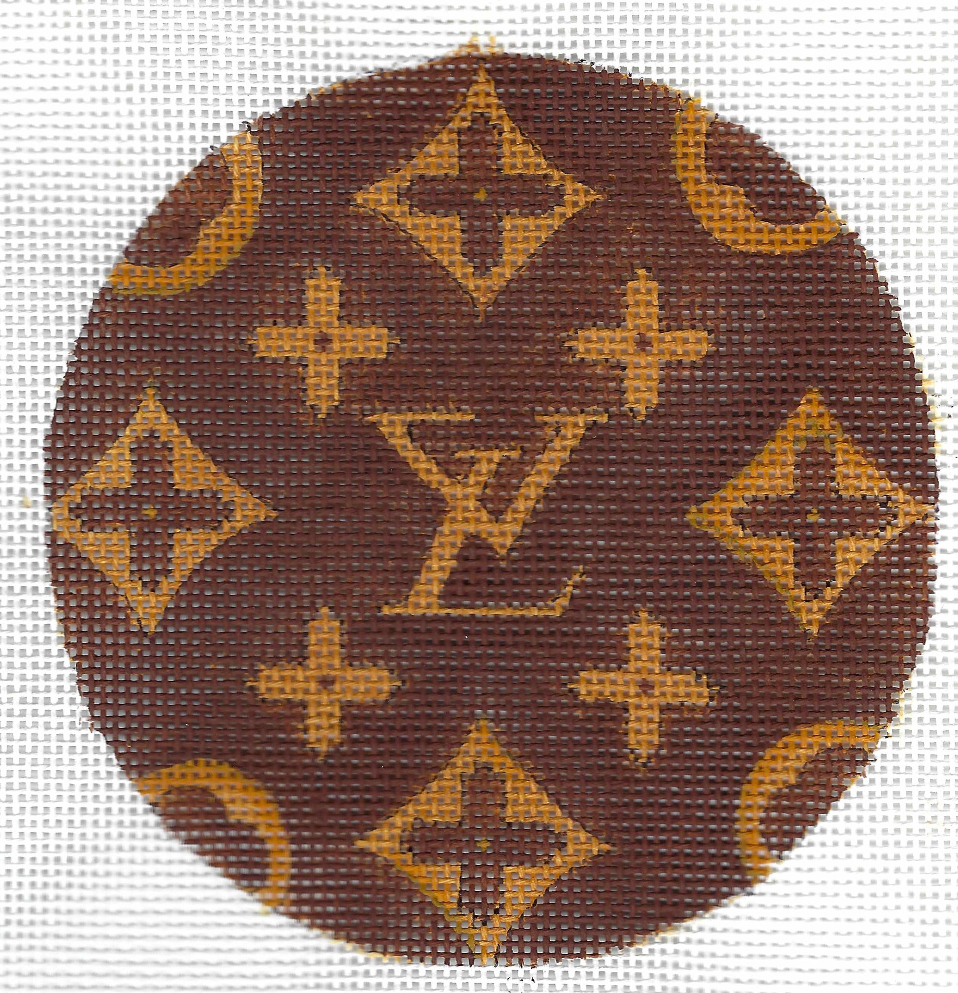 Alice Peterson Co circular monogram canvas needlepoint design featuring a brown and tan LV pattern.