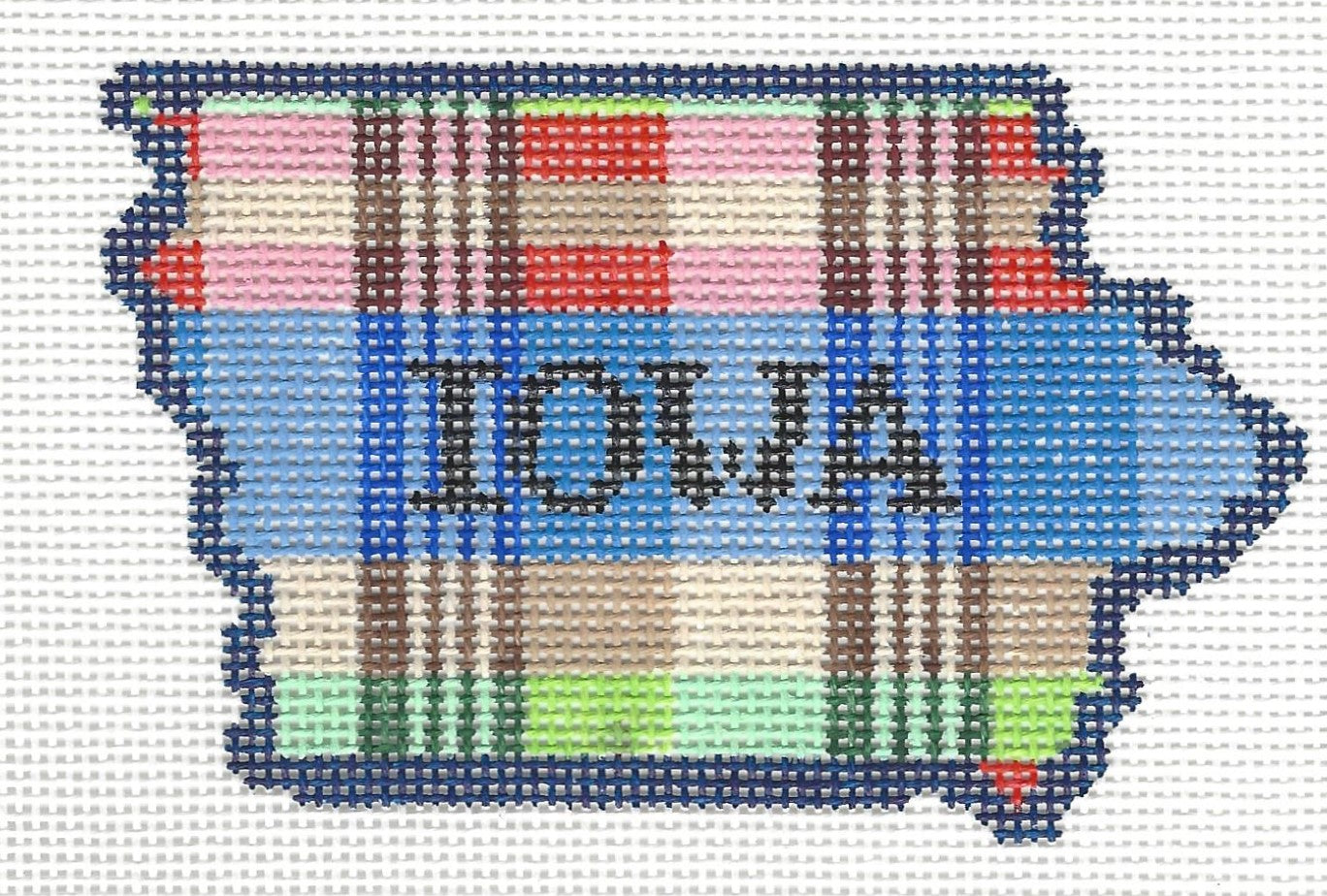 Stitchtent needlepoint canvas featuring the state outline of Iowa with a plaid pattern and the word 'IOWA' in the center.