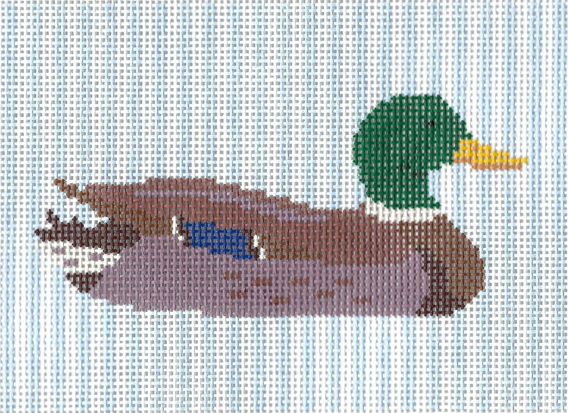 Maura Nolan needlepoint canvas of a mallard on a striped white and light blue background.
