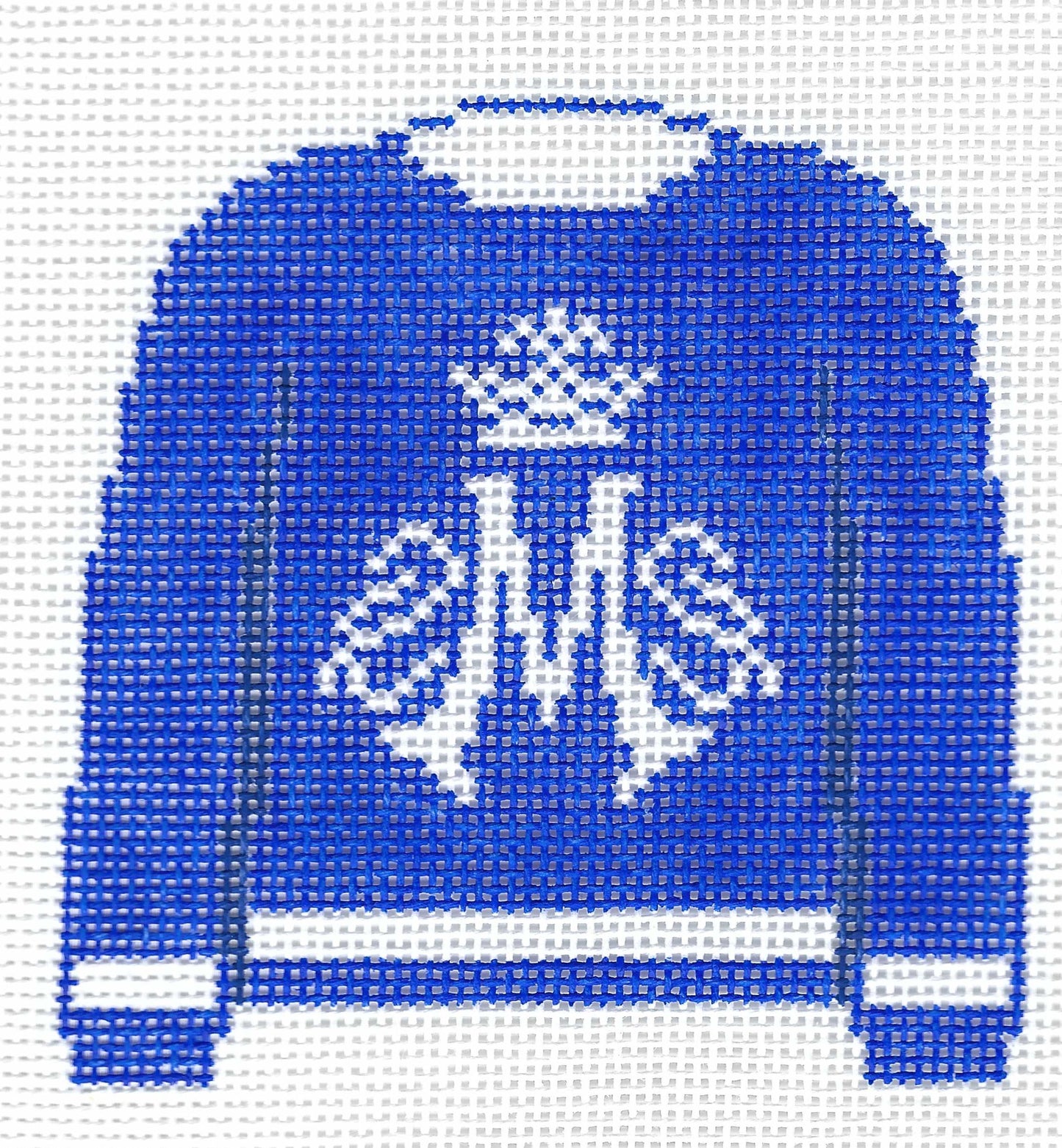 Needlepoint canvas of a blue pullover sweater with white Marian logo on a white background.