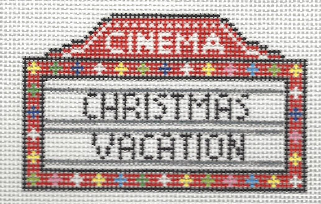 Needlepoint by Laura canvas of movie theater marquee with 'Christmas Vacation' text on a white background.