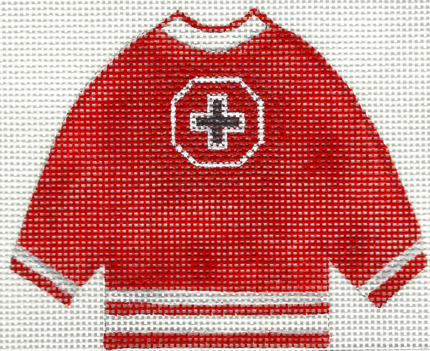 Needlepoint canvas of a red pullover Mount Michael sweater.