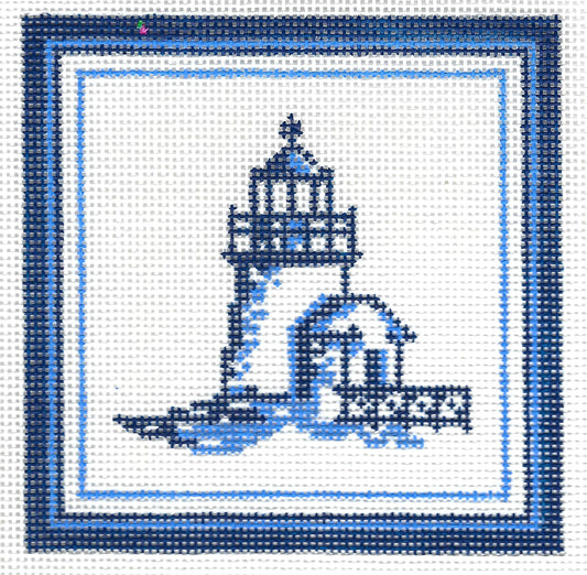 Kirk & Bradley square needlepoint canvas featuring a blue and white lighthouse and small house design, bordered by concentric blue and white frames on a white background.