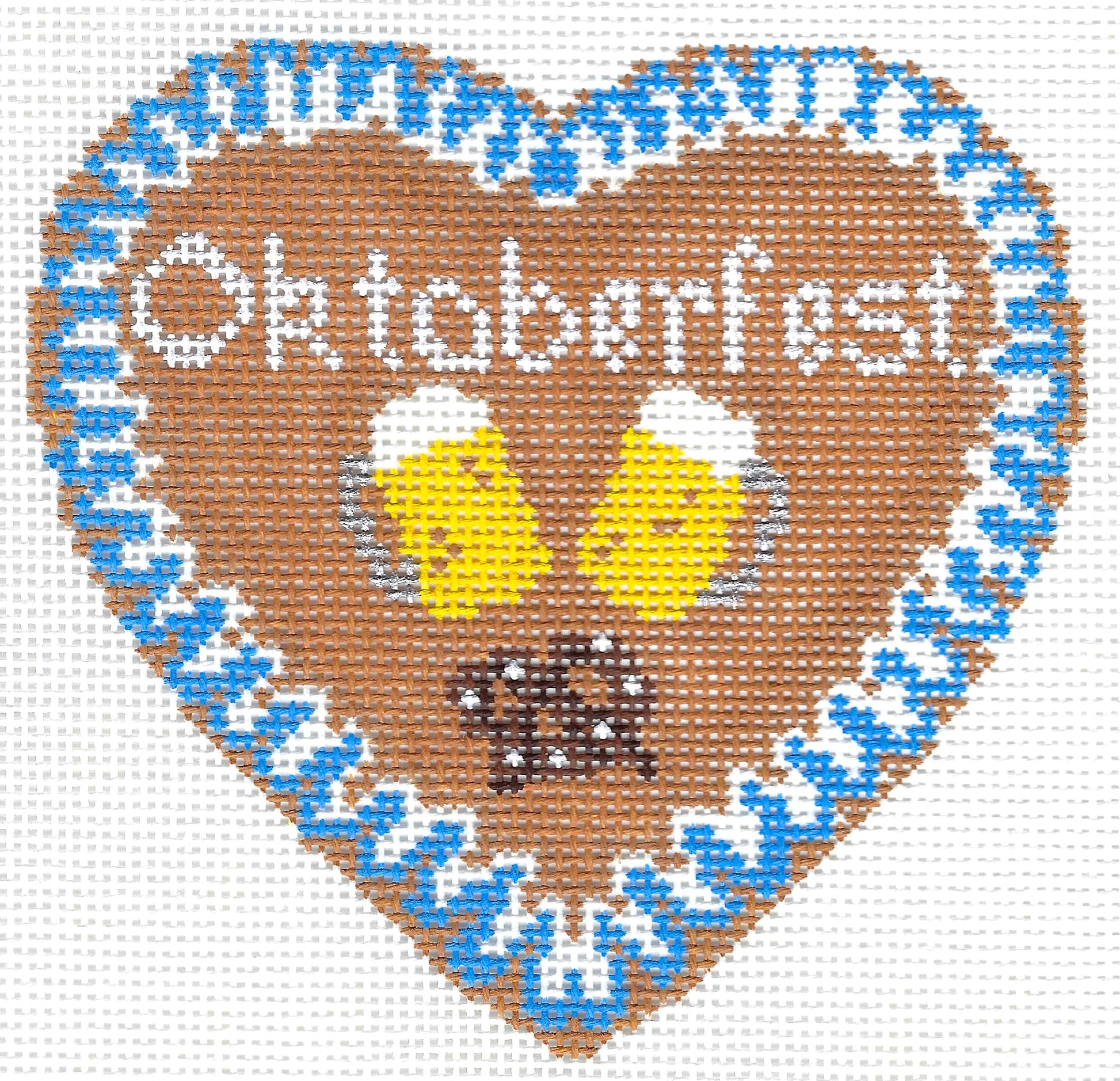 Blue Ridge Stitchery needlepoint canvas of a brown heart-shaped design featuring the word 'Oktoberfest' in white, two yellow beer mugs with white foam, and a brown pretzel, surrounded by a blue-and-white patterned border on a white background.