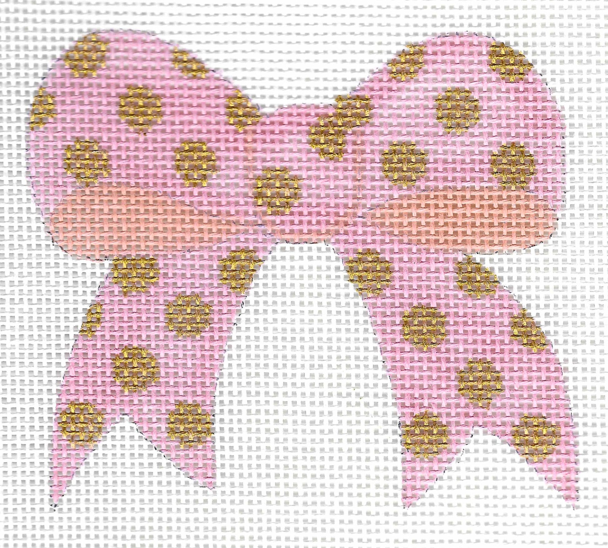 Patricia Stone needlepoint canvas of a pink bow with gold polka dots on a white background.