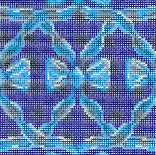 Needlepaint needlepoint canvas design of light blue bows on a dark blue background.
