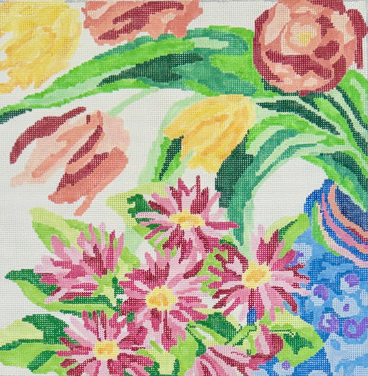 Jean Smith needlepoint canvas of a close-up floral patterned surface featuring pink and yellow flowers with green leaves on a white background.