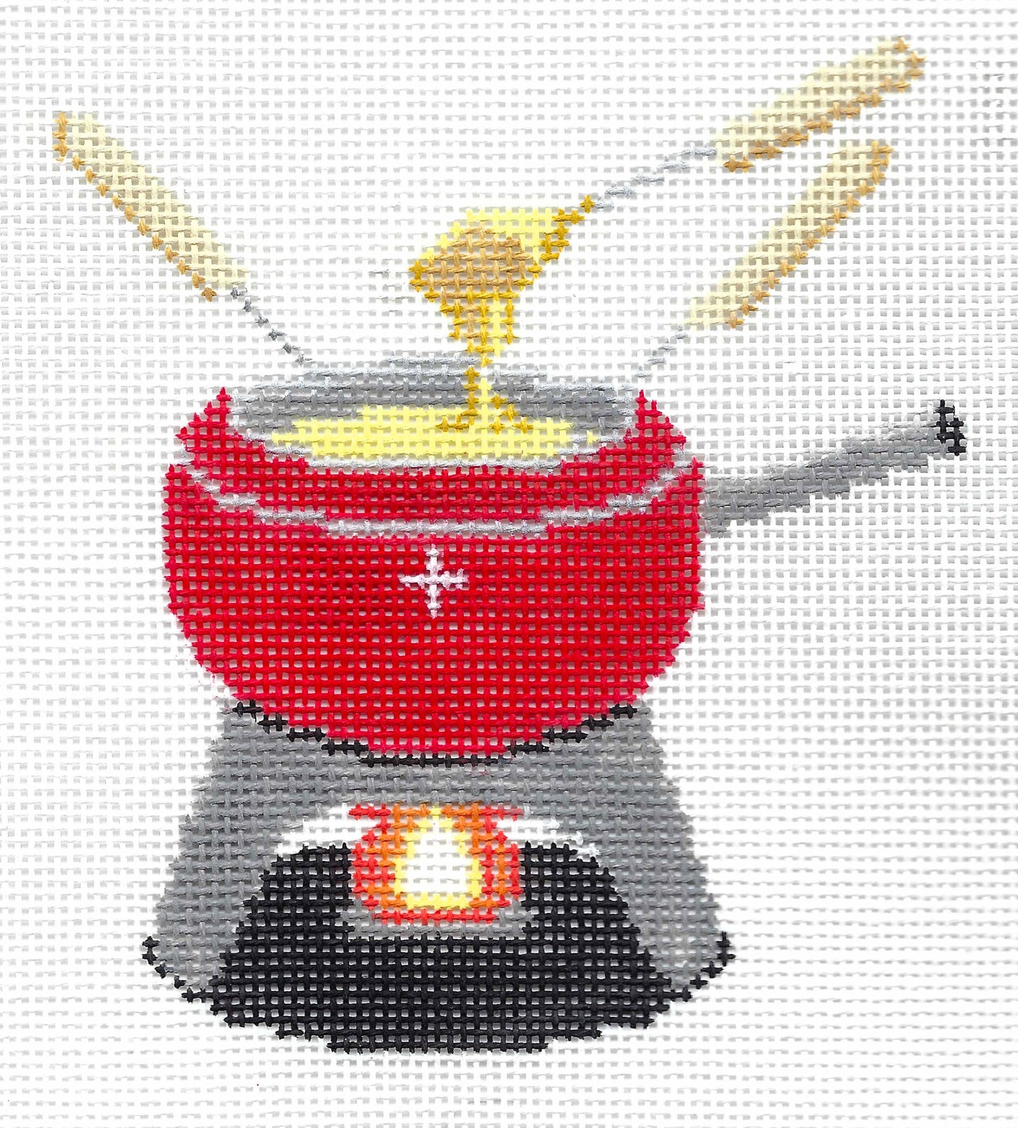 Stitch Style needlepoint canvas of a red, Swiss fondue pot and forks on a white background