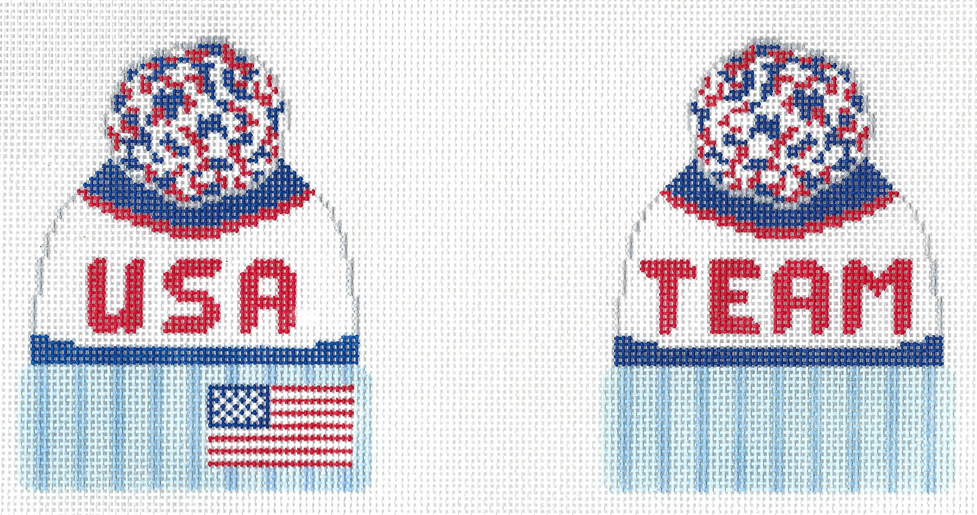 Lauren Bloch Designs two-sided needlepoint canvas of a beanie with 'USA' text and an American flag on one side and 'TEAM' text on the other side, with a red/white/blue pom pom on top.