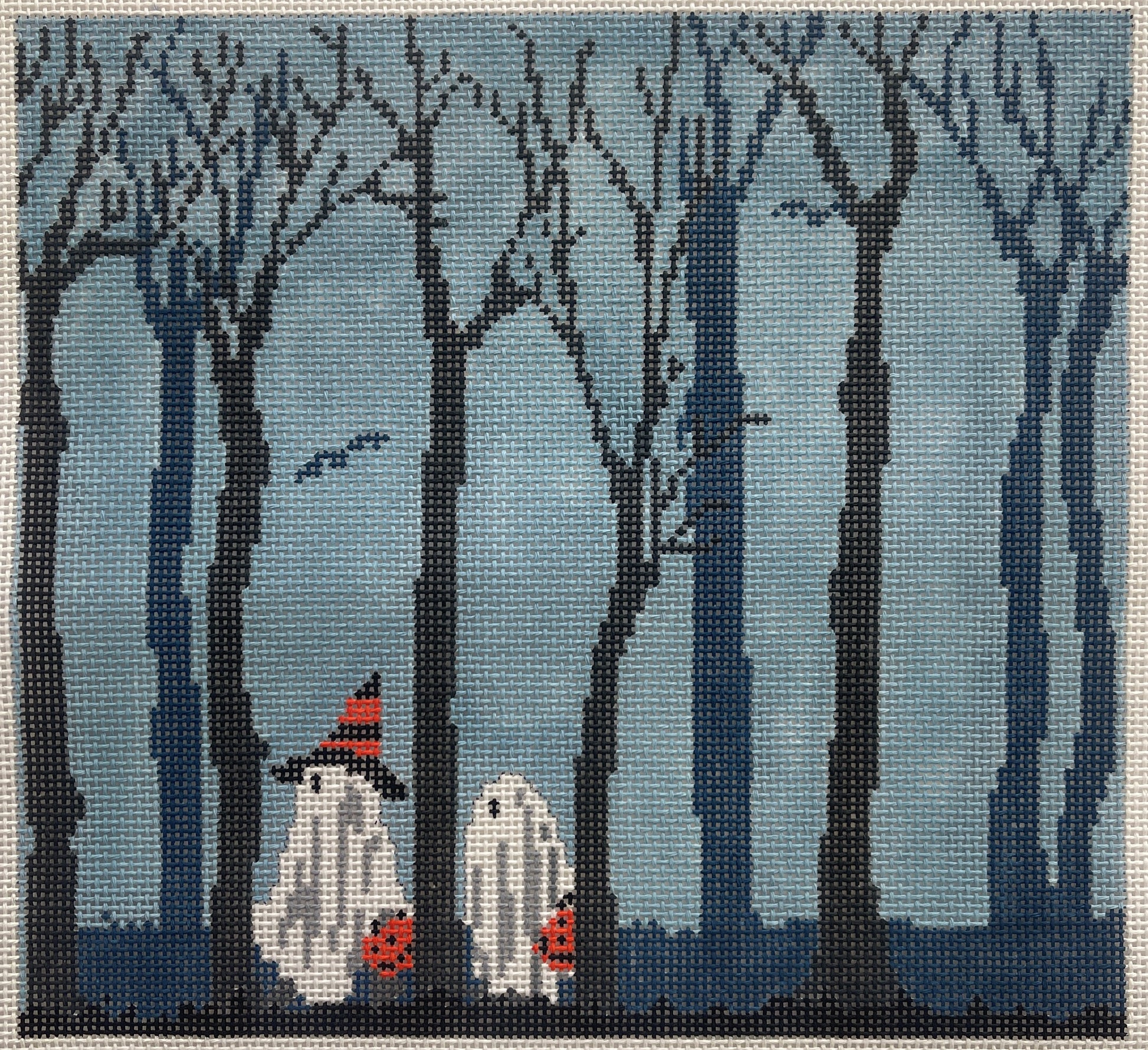 Scott Church needlepoint canvas of two trick-or-treaters dressed as ghosts walking in a dark forest of bare trees.
