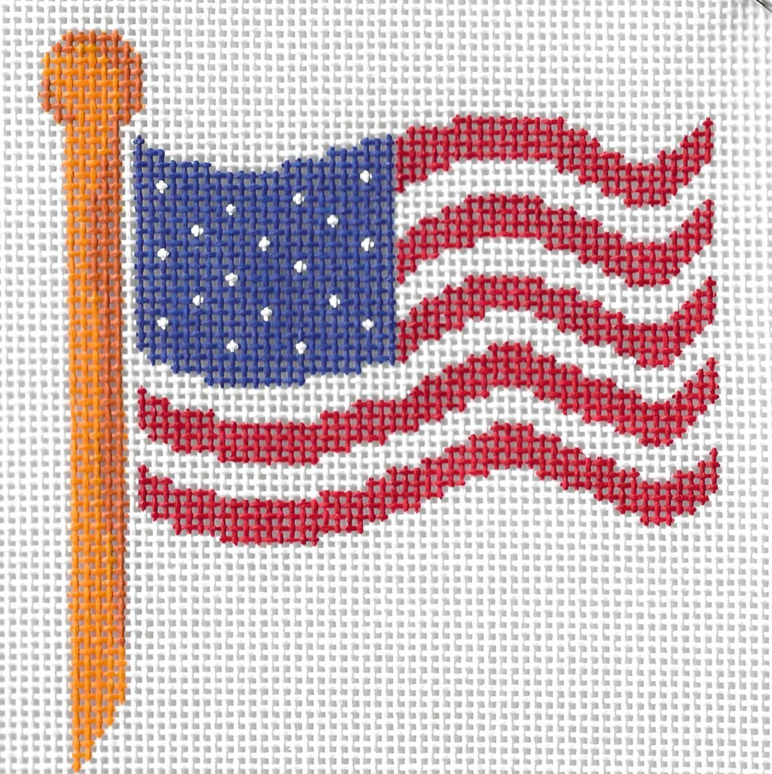 k.ndlpt needlepoint canvas of American flag waving on a brass pole