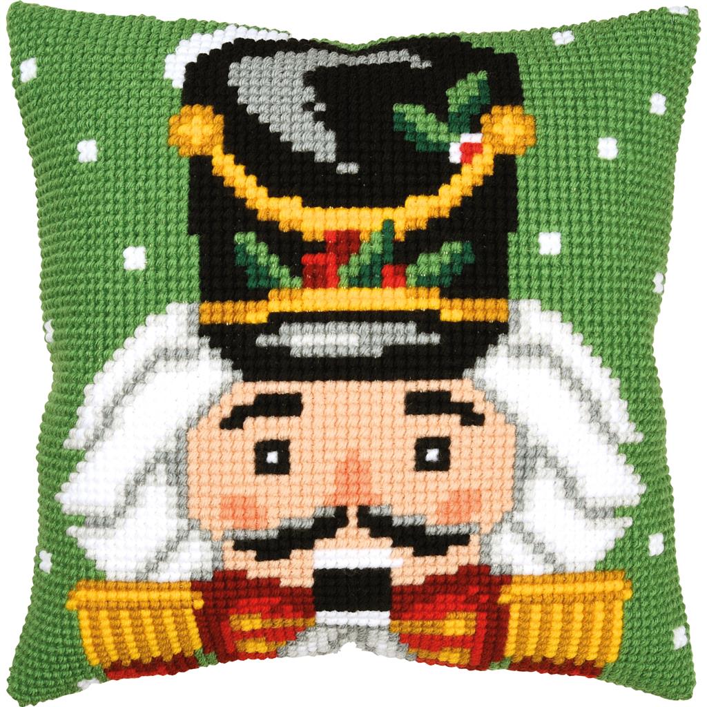 Vervaco DiY Kits featuring a festive green and white pattern with a central illustration of a nutcracker soldier wearing a black and gold hat.